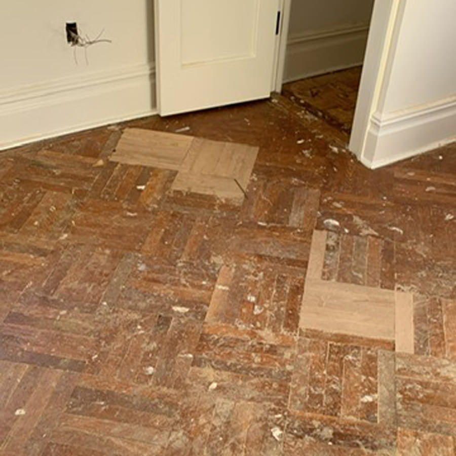 hardwood floor that needs repair